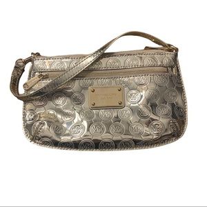 Michael Kors Gold Metallic Clutch/Wristlet in Shiny Gold